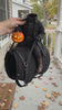 Cat wearing the headless horseman pet costume